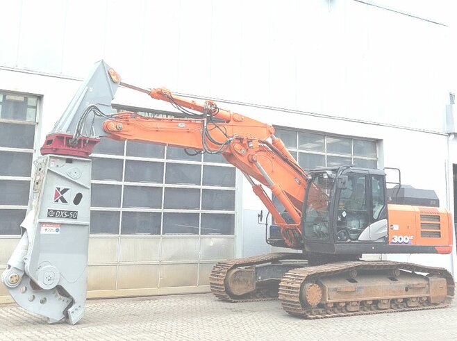 Hitachi ZX300LC-6 + Demarec DXS-50