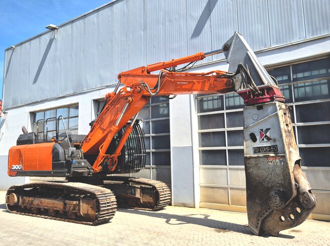 Hitachi ZX300LC-6 + Demarec DXS-50